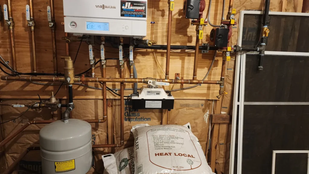 Wall-mounted boiler with expansion tank in a tidy utility area