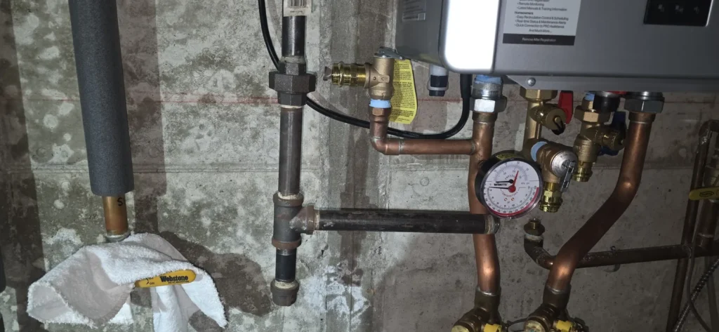 New boiler near-piping with circulators and gauges