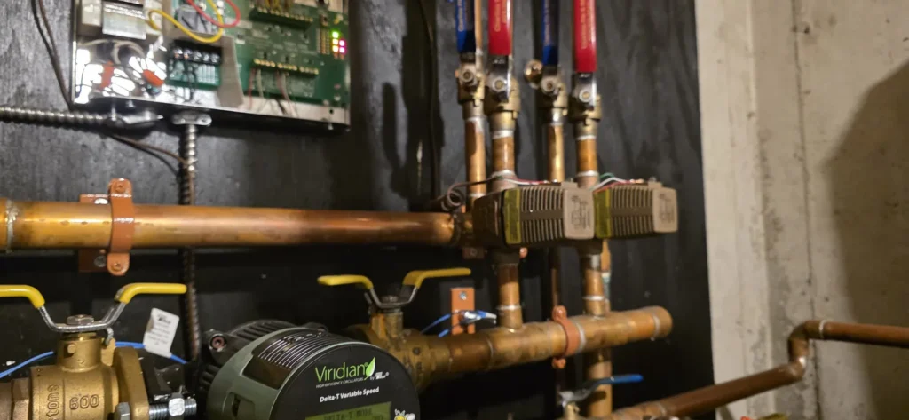 Clean copper boiler zone piping with circulator pumps