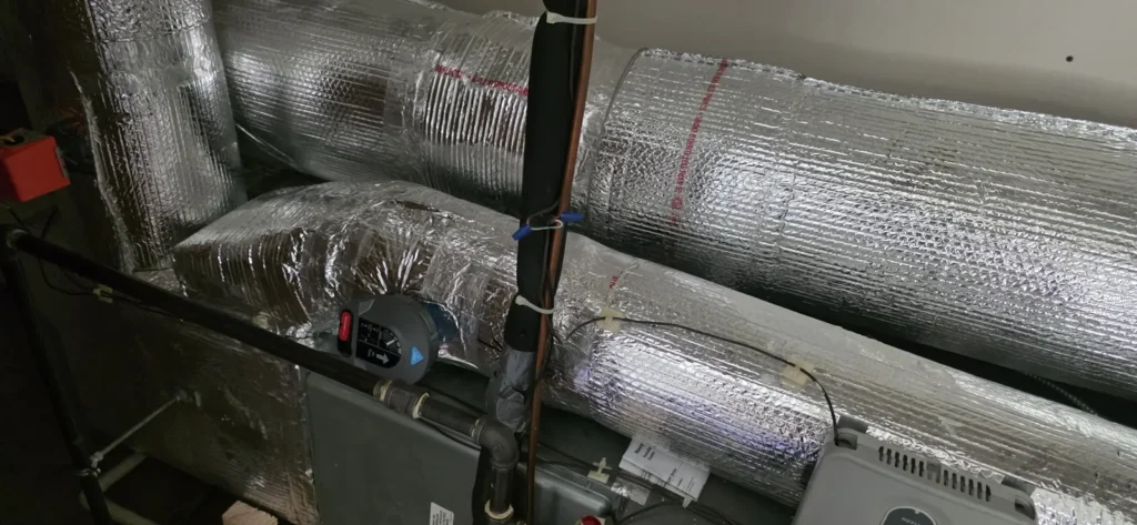 Concealed ducted air handler connected to insulated flex duct