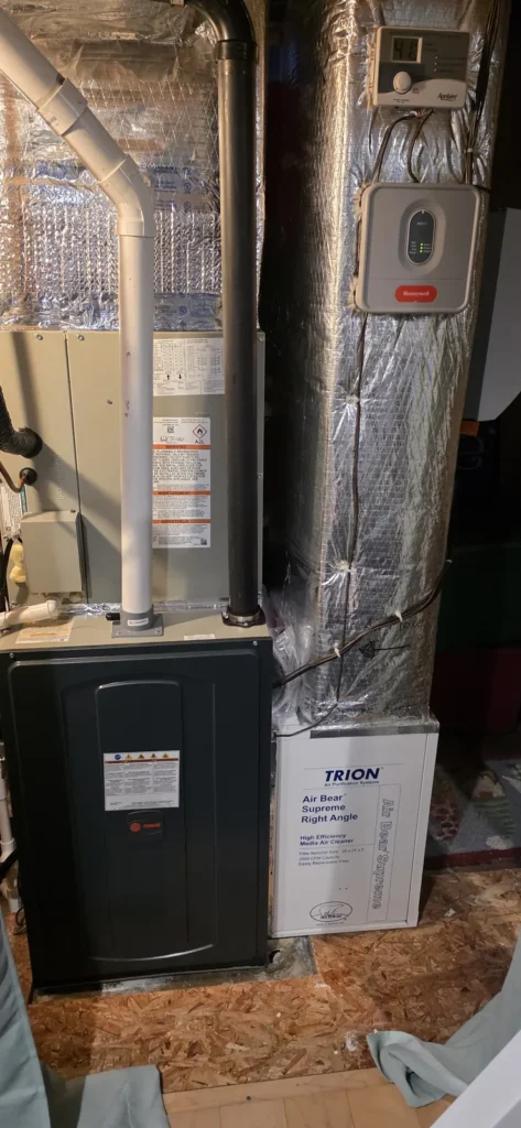Furnace with clean sheet-metal plenum and ductwork