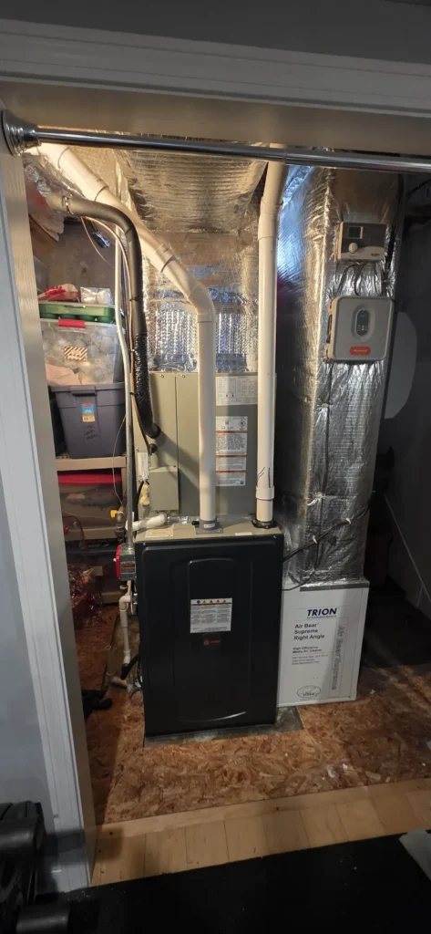 Gas furnace and venting installed in a basement