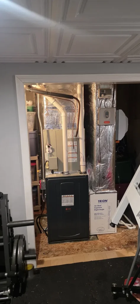Gas furnace installed in a finished utility room