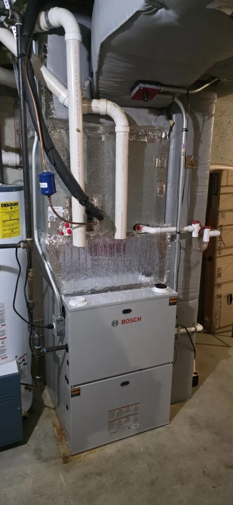 High-efficiency gas furnace with PVC venting