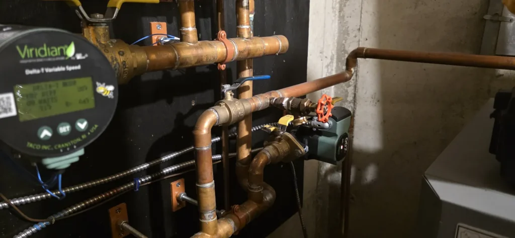 Hydronic boiler piping and circulators