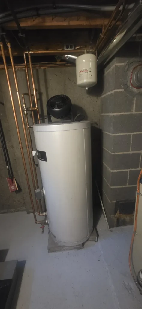 Indirect water heater installed in a utility room