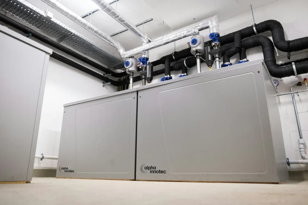 Indoor ground-source geothermal heat pump units in a clean mechanical room