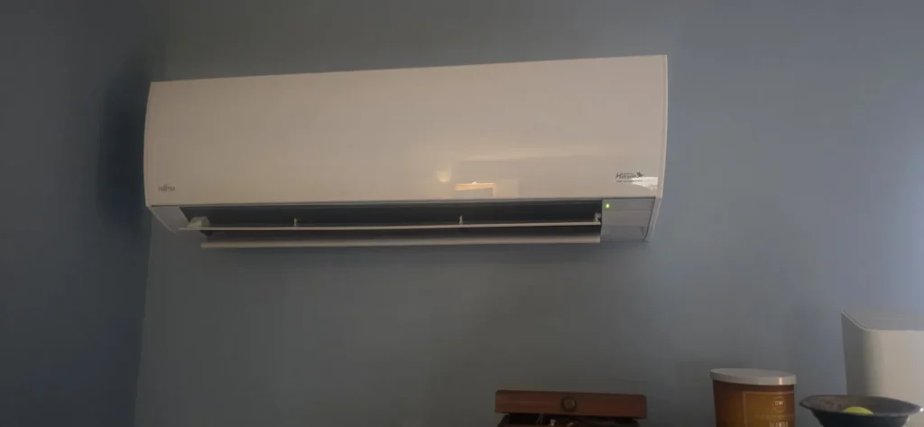 Ductless mini-split indoor unit installed on a wall