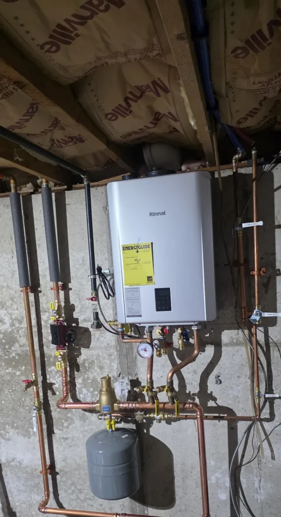Wall-mounted tankless water heater with new piping
